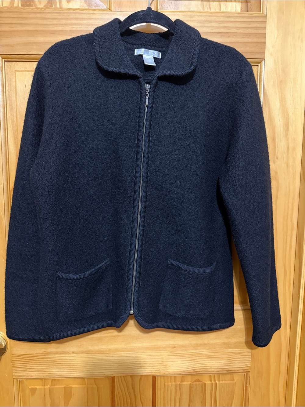 Heirlooms Women's Black Zip-Front Vintage Boiled Wool Jacket with Pocket Detail.